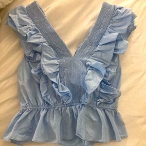 Blue ruffle shirt no stains or rips